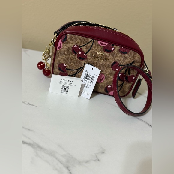 Coach Handbags - Coach Cherry Pattern Crossbody Bag - Tan and Red